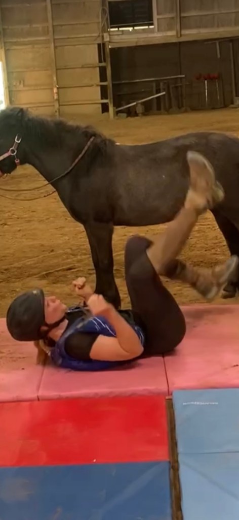 Mongol Derby rider practicing falling off a live horse